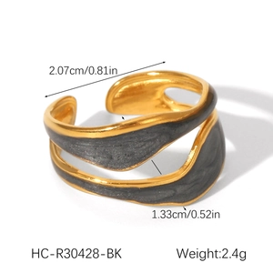 Detailed view of wave-shaped ring dimensions showing 2.07cm diameter and enamel inlay