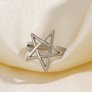 Adjustable silver star cutout ring in stainless steel with a polished vintage finish