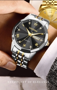 Detail of luxury men's two-tone quartz watch with black dial and luminous hands
