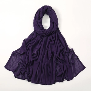 Detail of soft dark purple modal scarf showing breathable fabric texture and natural drapes