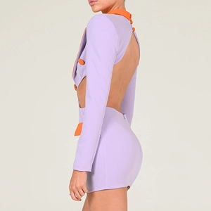 Detail of purple mini dress with orange lapels, side cut-outs and backless design