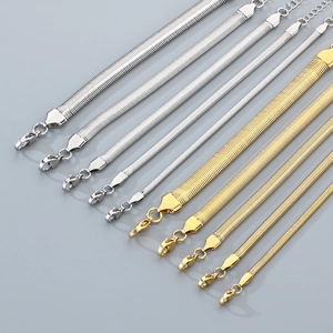 Flat stainless steel snake chain bracelets in various widths and gold or silver finishes