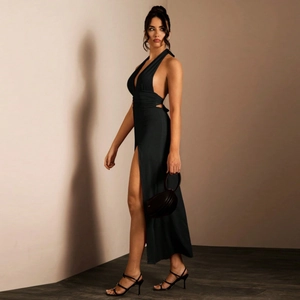 Elegant black backless halter neck maxi dress with high slit for formal evening events
