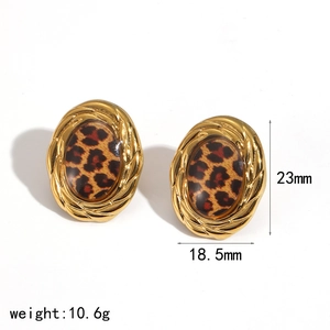 Detail of leopard print resin earrings with gold twisted rope border and size specs
