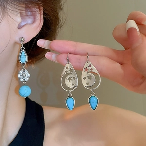 Bohemian retro silver drop earrings with turquoise stones and hollow moon star patterns