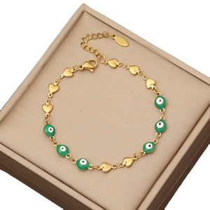 Golden stainless steel heart chain bracelet with green evil eye enamel charms for women