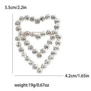 Hollow heart brooch in gold metal with sparkling rhinestones and size measurements