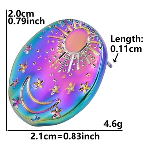 Detailed macro view showing the celestial sun and moon motifs on a 304 steel earring