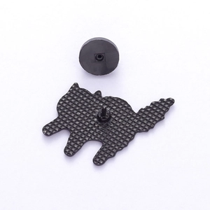 Cute black cat enamel pin with flower detail and black rubber clutch on a white background