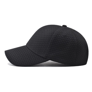 Minimalist black baseball cap with premium textured diamond weave pattern for men and women