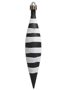 Macro detail of teardrop Christmas ornament with black finish and white glitter stripes