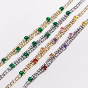 Detailed close-up of double-row tennis chain with multi-color cubic zirconia on white background