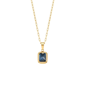 Gold paperclip chain necklace with rectangular blue zircon stone on white background