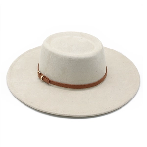 Top view of cream fedora hat featuring a brown leather band and gold buckle detail