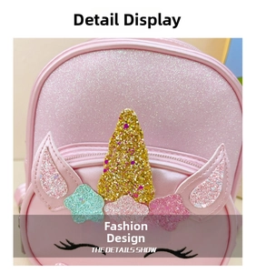 Detailed view of pink unicorn kid backpack featuring gold sequins and glitter ear accents