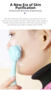 Close-up of a blue dual-sided silicone facial brush showing soft bristles for deep cleansing