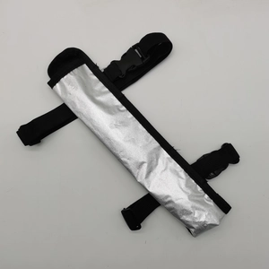 Detail of the silver reflective surface and adjustable black strap with plastic buckle