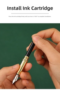 Close-up showing the installation of an ink cartridge into a metal business fountain pen