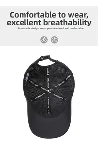 Detailed interior of black quick-dry cap showing mesh fabric and adjustable buckle