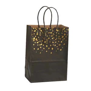 Premium black kraft paper gift bag with elegant gold foil heart patterns and twisted rope handles