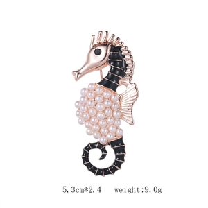 Detailed seahorse brooch view with white pearls and black enamel in 5.3cm length