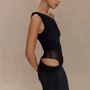 Detail of black one-shoulder dress showing waist cut-out and elegant ruched fabric