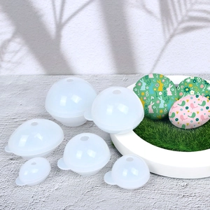 Detailed view of 6-piece semi-transparent silicone egg molds for resin and Easter DIY crafts