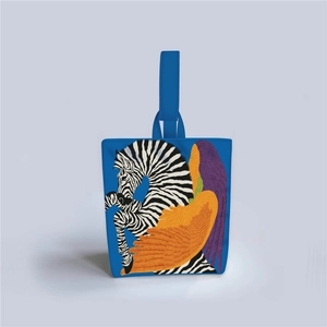 Close-up of blue canvas tote bag featuring a vibrant winged zebra artistic pattern