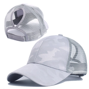 Detail showing breathable grey camouflage mesh panels and ponytail opening on baseball cap