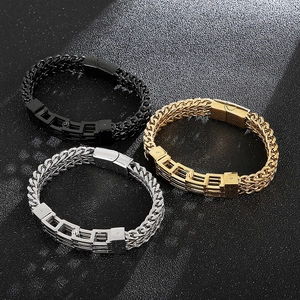 Detailed view of woven metal bracelets in black, gold, and silver finishes with magnetic clasp