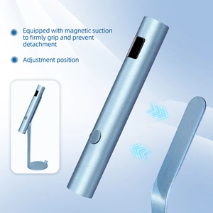 Detail of blue UV nail lamp with magnetic stand and digital display screen for manicure