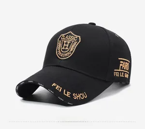 Detailed close-up of shield embroidery and classic letter patterns on black canvas cap