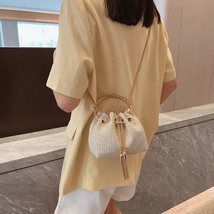 Sparkly rhinestone bucket bag for women with gold ring handle and chain strap crossbody