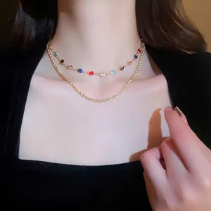 Double-layered gold-plated choker with multi-color zircon gems and twisted rope chain necklace