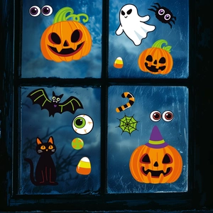 Close-up of Halloween window stickers featuring pumpkin, ghost and bat on aged wood