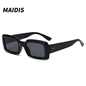 Retro rectangle black sunglasses with thick frames and dark grey UV lenses for street style