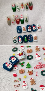 Detailed view of Christmas themed nail art stickers featuring Santa, reindeer and snowflakes