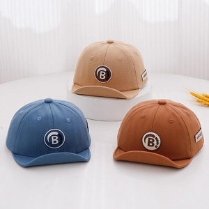 Kids cotton baseball caps with letter B patch in khaki, blue, and brown earth tones