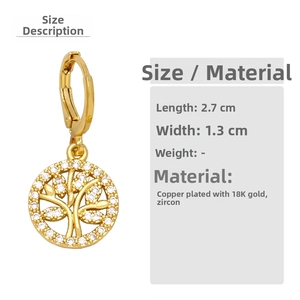 Detail view of 18K gold plated tree of life earrings with sparkling cubic zirconia crystals