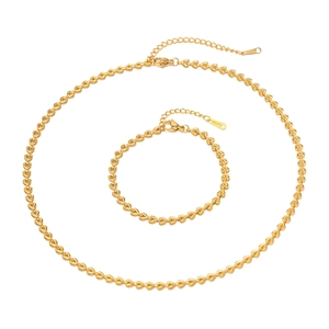 Polished 18k gold plated stainless steel necklace and bracelet set with heart links