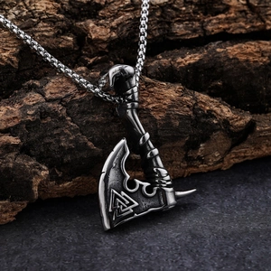 Viking axe pendant necklace in silver stainless steel with Valknut engraving on dark wood