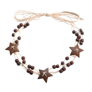 Bohemian braided waist belt with star wood charms and coffee beads on a white background