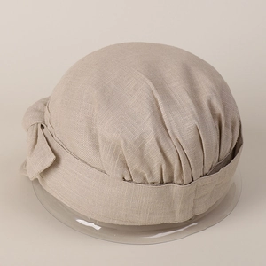 Elegant beige cotton linen newsboy hat with pleated design and bow decoration