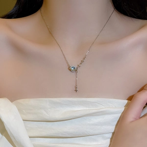 Silver celestial Saturn pendant necklace with moonstone and dangling star for women