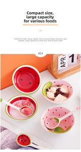 Macro detail of watermelon patterned ceramic bowls and spoons with vibrant red and green glaze