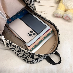 Street style leopard print corduroy backpack with spacious interior for laptop and daily items