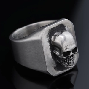 Punk style skull ring in vintage silver stainless steel with a brushed matte finish