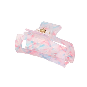 Macro view of 8.2cm acetate hair claw clip showing pink and blue marble texture