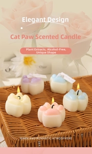 Detailed view of colorful cat paw scented candles made of natural soy wax and plant extracts