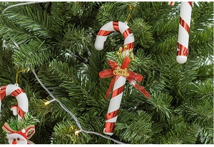 30cm red and white Christmas candy cane with golden bell and bow on a tree branch